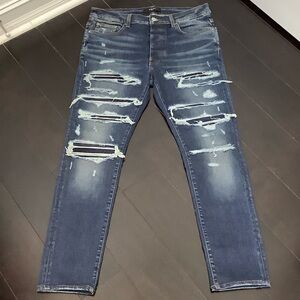 AMIRI Dark Blue Distressed Skinny Jeans